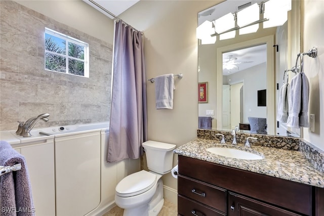 bathroom with ceiling fan, vanity, and toilet