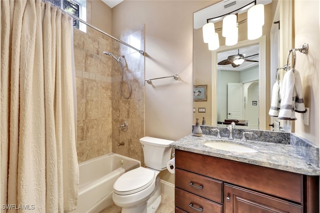 full bathroom with ceiling fan, vanity, shower / tub combo with curtain, and toilet