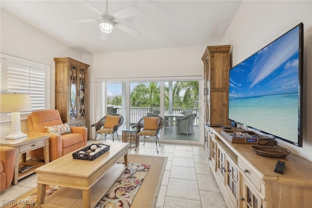 tiled living room with ceiling fan