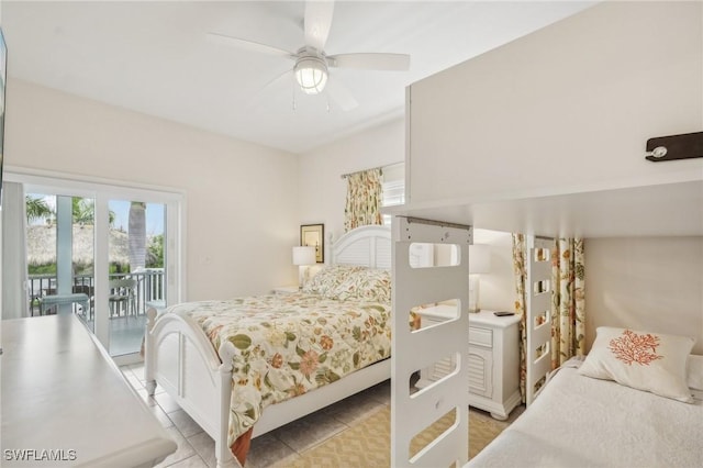 tiled bedroom with access to outside and ceiling fan