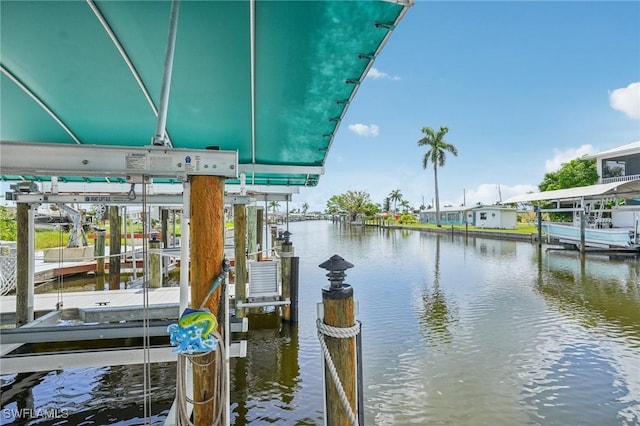 view of dock featuring a water view