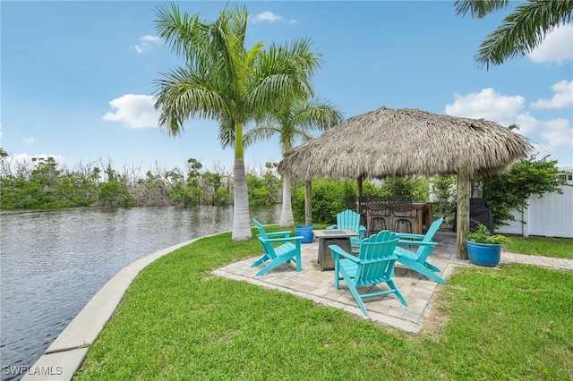 exterior space with exterior bar and a water view