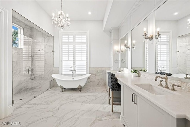 bathroom with vanity, separate shower and tub, tile walls, and a chandelier