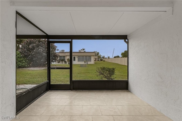 unfurnished sunroom with plenty of natural light