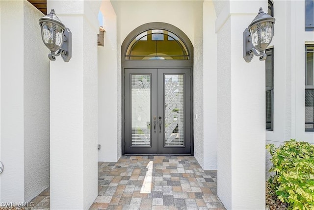 view of exterior entry with french doors