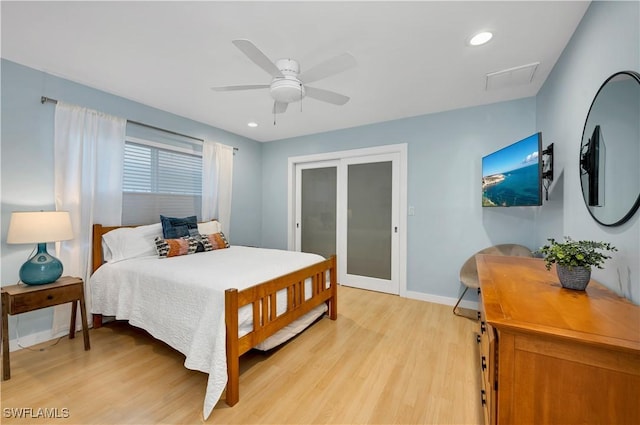 bedroom featuring light wood-type flooring and ceiling fan