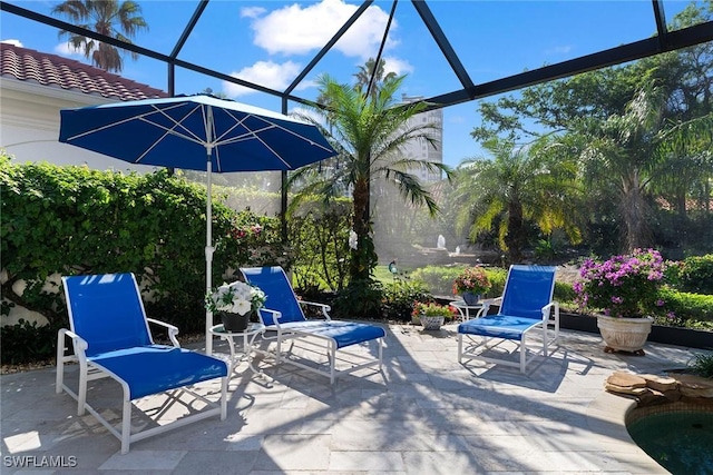 view of patio / terrace with a lanai