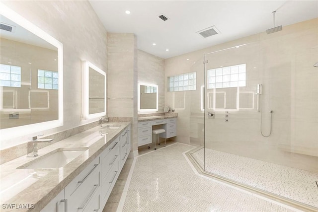 8723 La Palma Ln, Naples, FL 34108 - full bath featuring a shower stall, double vanity, and tile patterned floors
