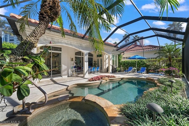 8723 La Palma Ln, Naples, FL 34108 - view of swimming pool with a patio area, a pool with connected hot tub, and a lanai