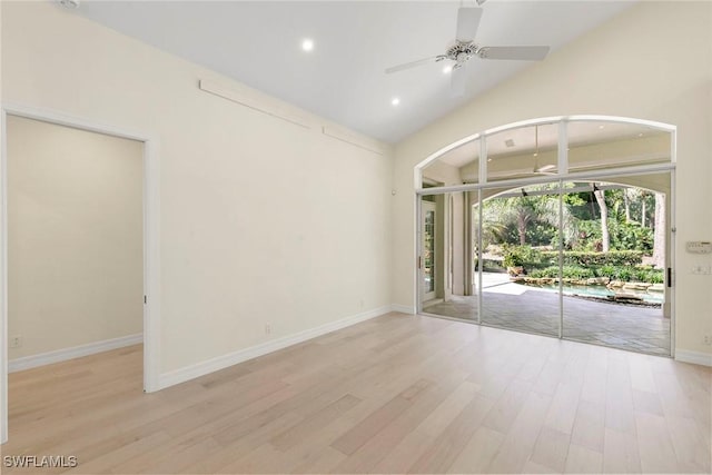 8723 La Palma Ln, Naples, FL 34108 - empty room with wood finished floors, ceiling fan, recessed lighting, and lofted ceiling