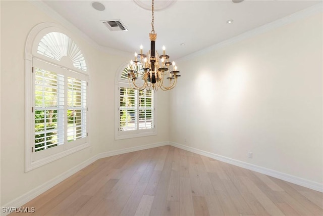 8723 La Palma Ln, Naples, FL 34108 - spare room featuring a chandelier, light wood-style flooring, crown molding, and recessed lighting
