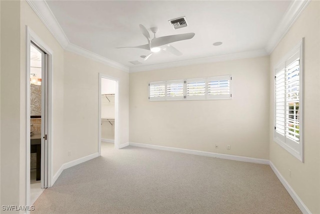 8723 La Palma Ln, Naples, FL 34108 - unfurnished bedroom with ornamental molding, carpet flooring, multiple windows, a spacious closet, and ceiling fan