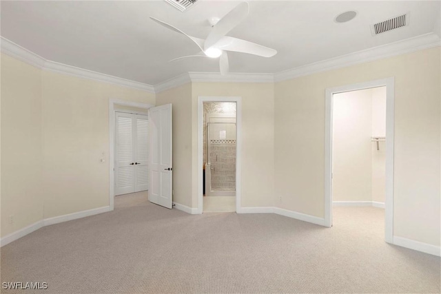 8723 La Palma Ln, Naples, FL 34108 - unfurnished bedroom with ornamental molding, light colored carpet, connected bathroom, and ceiling fan