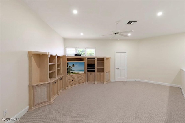 8723 La Palma Ln, Naples, FL 34108 - unfurnished living room with light colored carpet, recessed lighting, and a ceiling fan