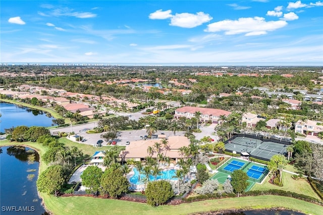 drone / aerial view with a water view