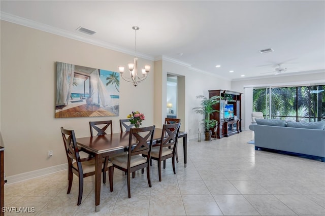 tiled dining room featuring ceiling fan with notable chandelier and ornamental molding