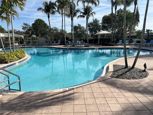 view of pool featuring a gazebo and a patio