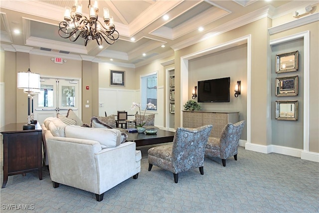 carpeted living room featuring an inviting chandelier, coffered ceiling, and ornamental molding