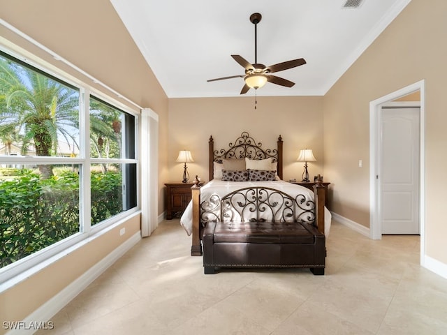 bedroom featuring multiple windows and ceiling fan