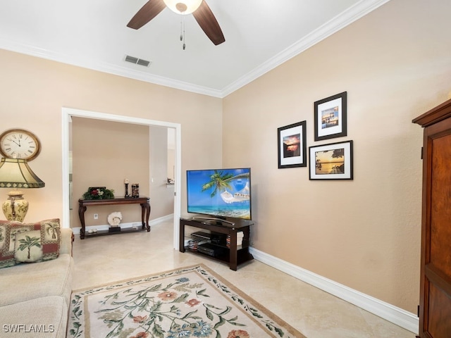 living room featuring ceiling fan and ornamental molding