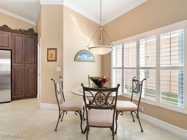 dining area with a healthy amount of sunlight, lofted ceiling, and ornamental molding