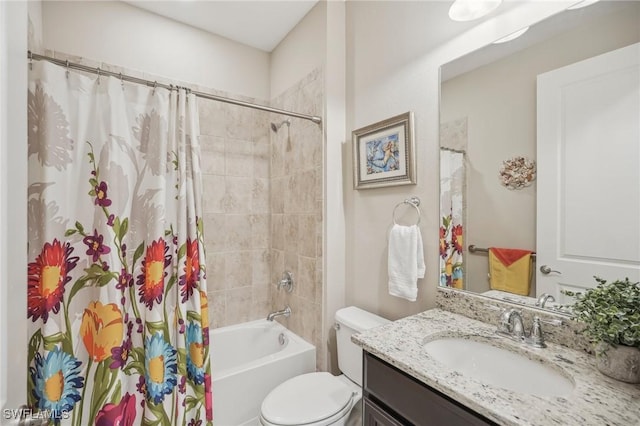 full bath with toilet, shower / bath combo with shower curtain, and vanity