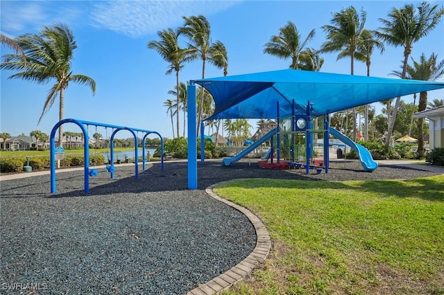 view of jungle gym with a lawn