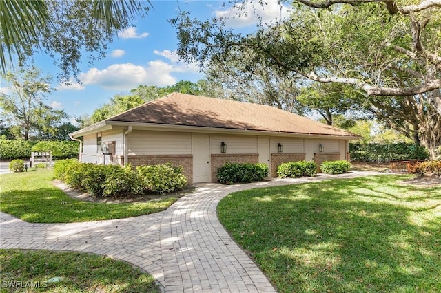 6600 Tannin Ln Unit C, Naples, FL 34109 - view of front of property featuring a front lawn