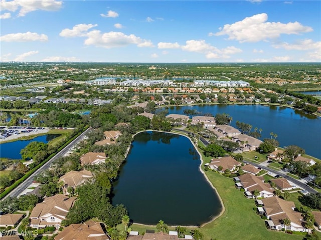6600 Tannin Ln Unit C, Naples, FL 34109 - drone / aerial view with a water view