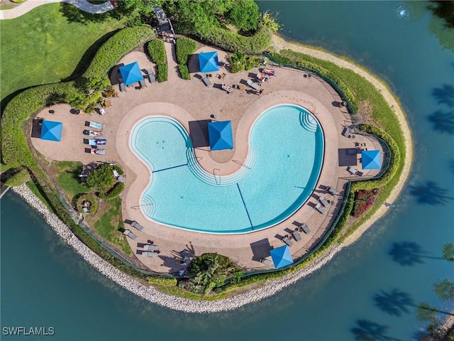 6600 Tannin Ln Unit C, Naples, FL 34109 - drone / aerial view with a water view