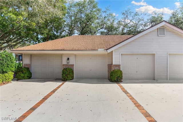 ranch-style home with a garage