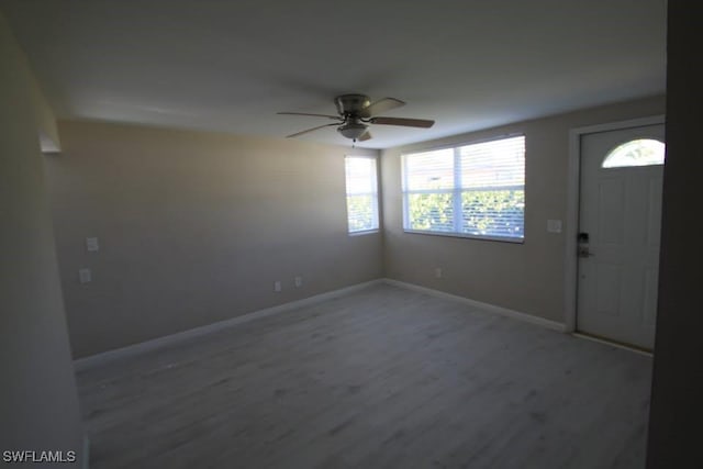 entrance foyer featuring ceiling fan and hardwood / wood-style flooring