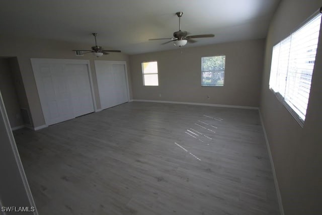 unfurnished bedroom featuring ceiling fan