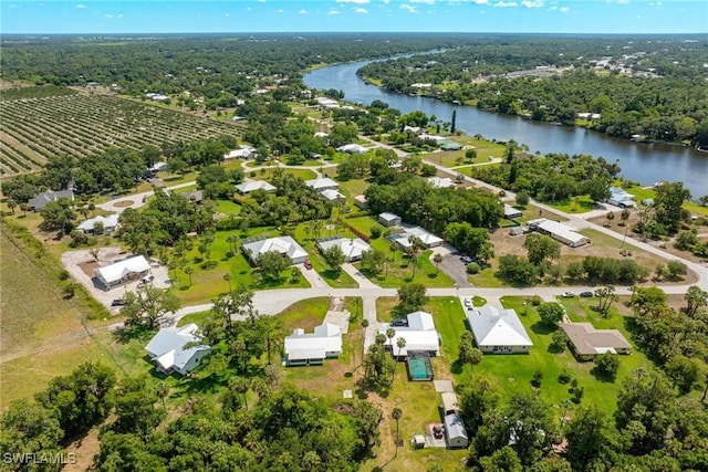 bird's eye view with a water view and a rural view