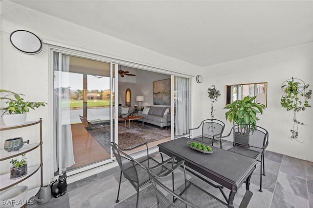 dining room with a ceiling fan