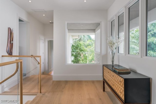 hallway with light wood-type flooring