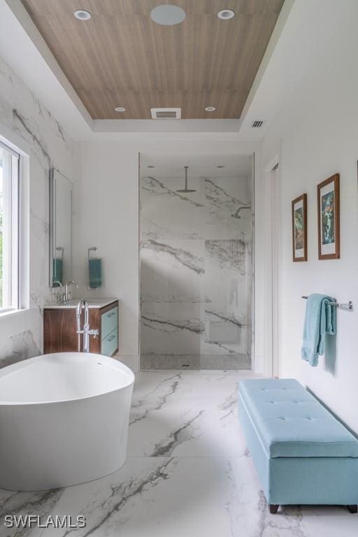 bathroom with shower with separate bathtub, wooden ceiling, and a tray ceiling