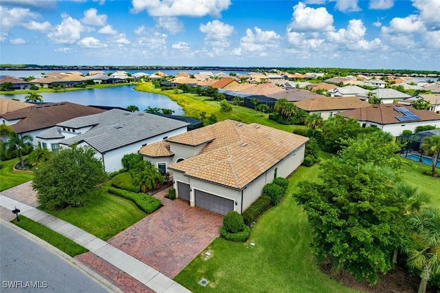 bird's eye view with a water view