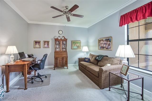 office area featuring light carpet, ceiling fan, a healthy amount of sunlight, and ornamental molding