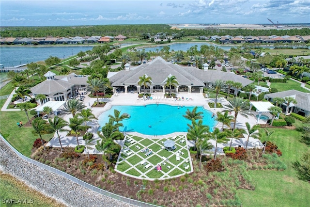 birds eye view of property featuring a water view