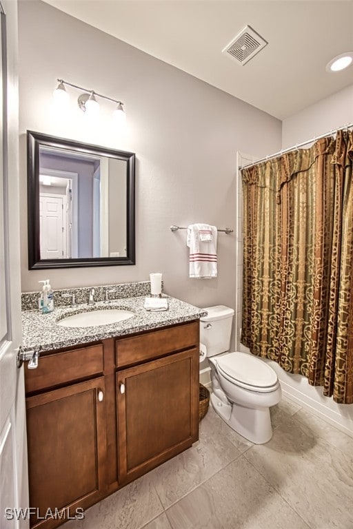 full bathroom with shower / bathtub combination with curtain, vanity, and toilet