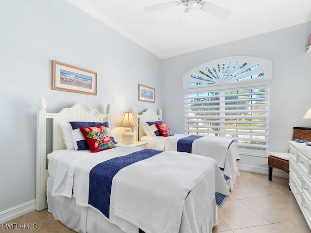 tiled bedroom with ceiling fan and ornamental molding