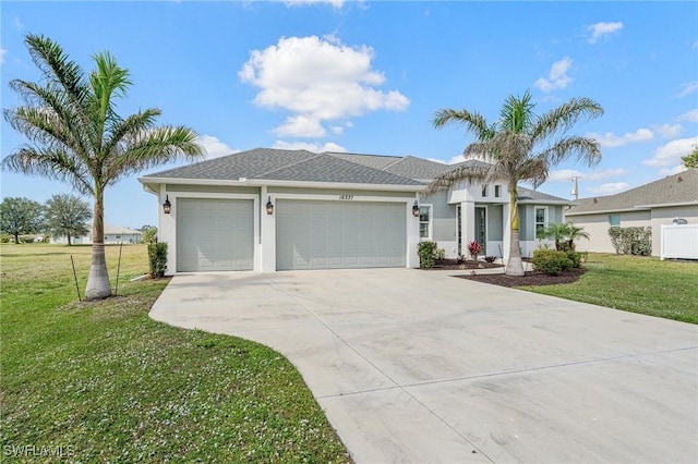 ranch-style house featuring a garage, driveway, a front lawn, and stucco siding