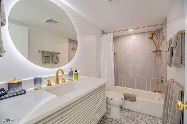 full bathroom with tile patterned flooring, vanity, toilet, and shower / tub combo