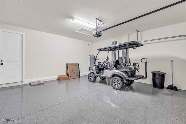 garage featuring a garage door opener