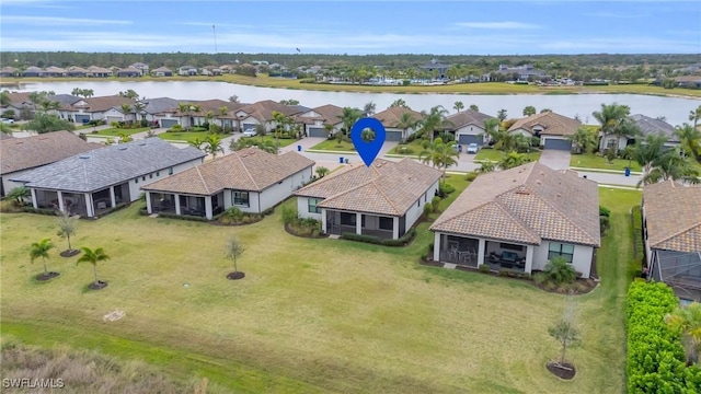 aerial view featuring a water view