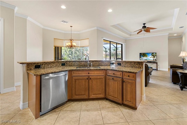 kitchen with dishwasher, a raised ceiling, sink, ceiling fan with notable chandelier, and stone countertops