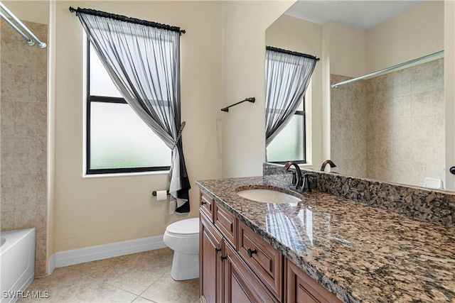 full bathroom featuring toilet, tile patterned flooring, shower / washtub combination, and vanity