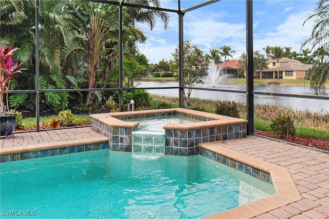 view of pool with a water view and an in ground hot tub