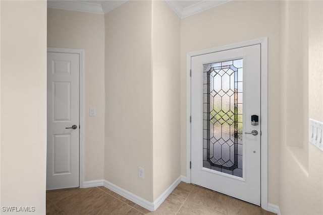 entryway with light tile patterned flooring and ornamental molding